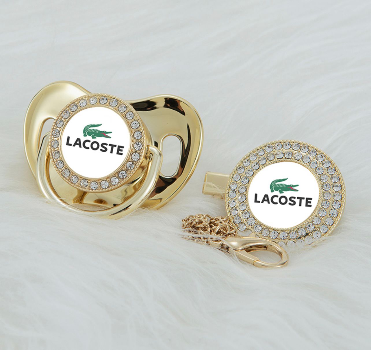Premium Baby Schnuller Lacoste gold-weiß mit Clip & Geschenkbox