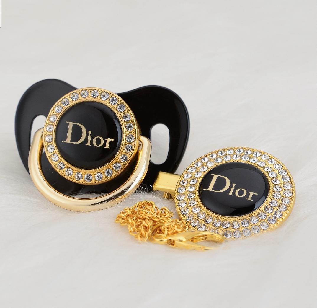 Premium Baby Schnuller Dior schwarz-gold mit Clip & Geschenkbox