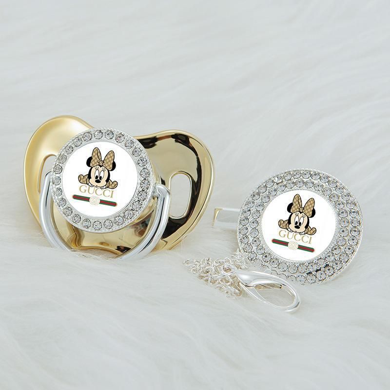 Premium Baby Schnuller Gucci gold-weiß mit Minnie Maus im Druck mit Clip & Geschenkbox