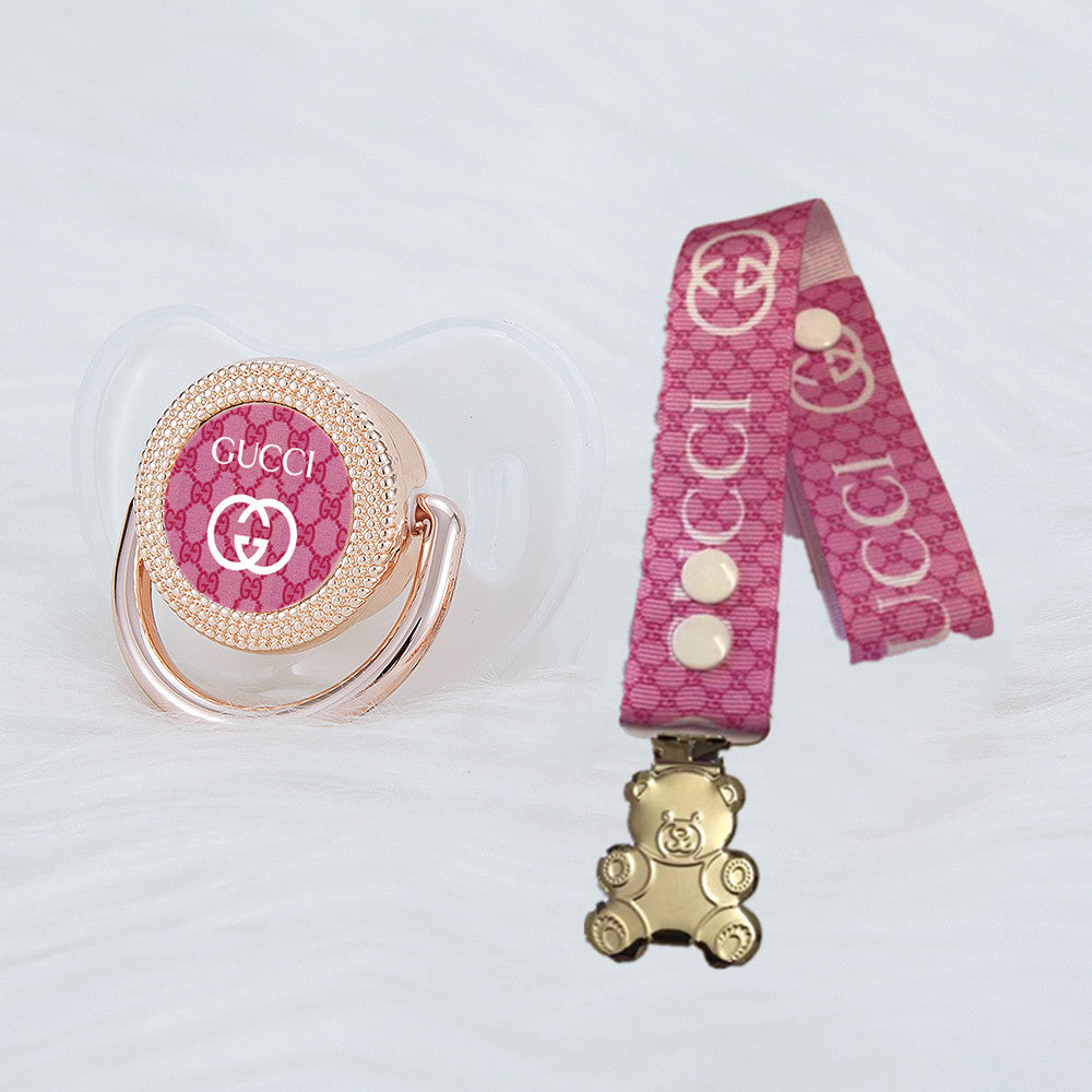 Premium Baby Schnuller Gucci Transparent-pink mit Minnie Maus im Druck + passender Schnullerband mit Teddybär Clipser mit Clip & Geschenkbox