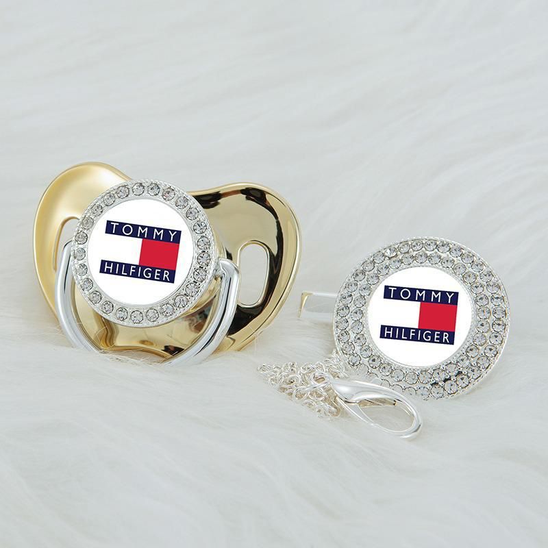 Premium Baby Schnuller Tommy Hilfiger gold mit Clip & Geschenkbox