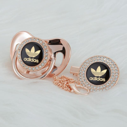 Premium Baby Schnuller adidas rose mit Clip & Geschenkbox