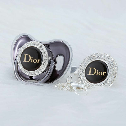 Premium Baby Schnuller Dior violett-schwarz mit Clip & Geschenkbox