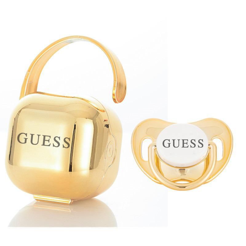 Premium Baby Schnuller Guess gold mit Aufbewahrungsbox & Geschenkbox