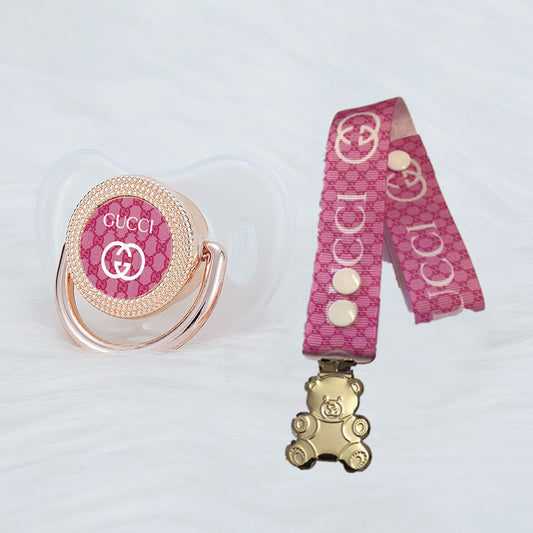 Premium Baby Schnuller Gucci Transparent-pink mit Minnie Maus im Druck + passender Schnullerband mit Teddybär Clipser mit Clip & Geschenkbox