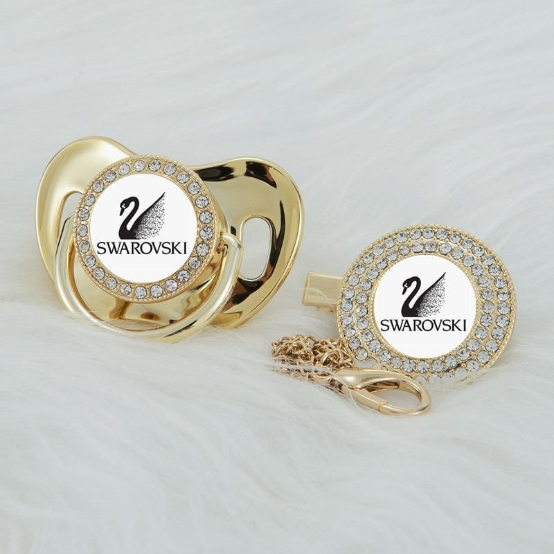 Premium Baby Schnuller Swarowski gold mit Clip & Geschenkbox