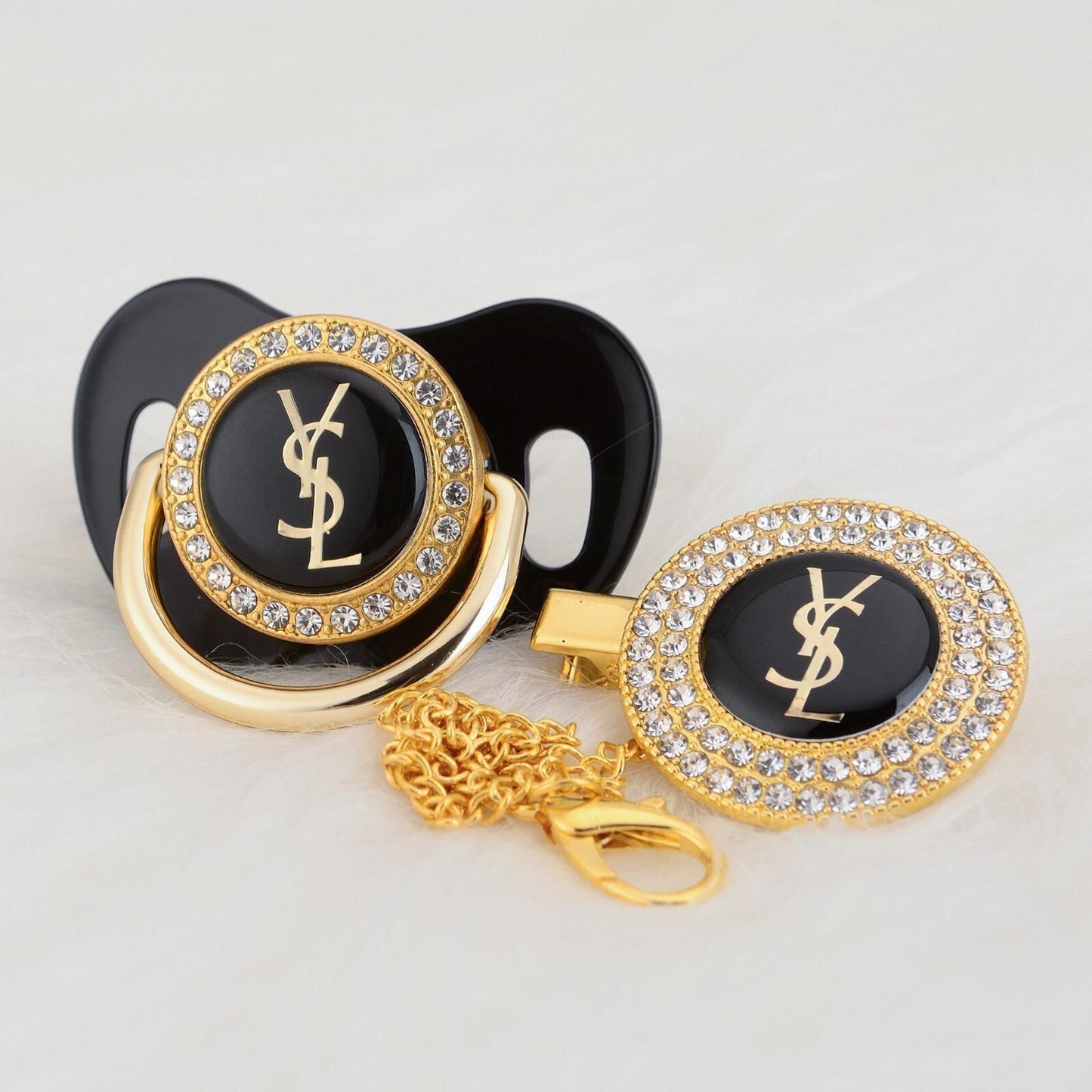 Premium Baby Schnuller Yves Saint Loren schwarz-gold mit Clip & Geschenkbox