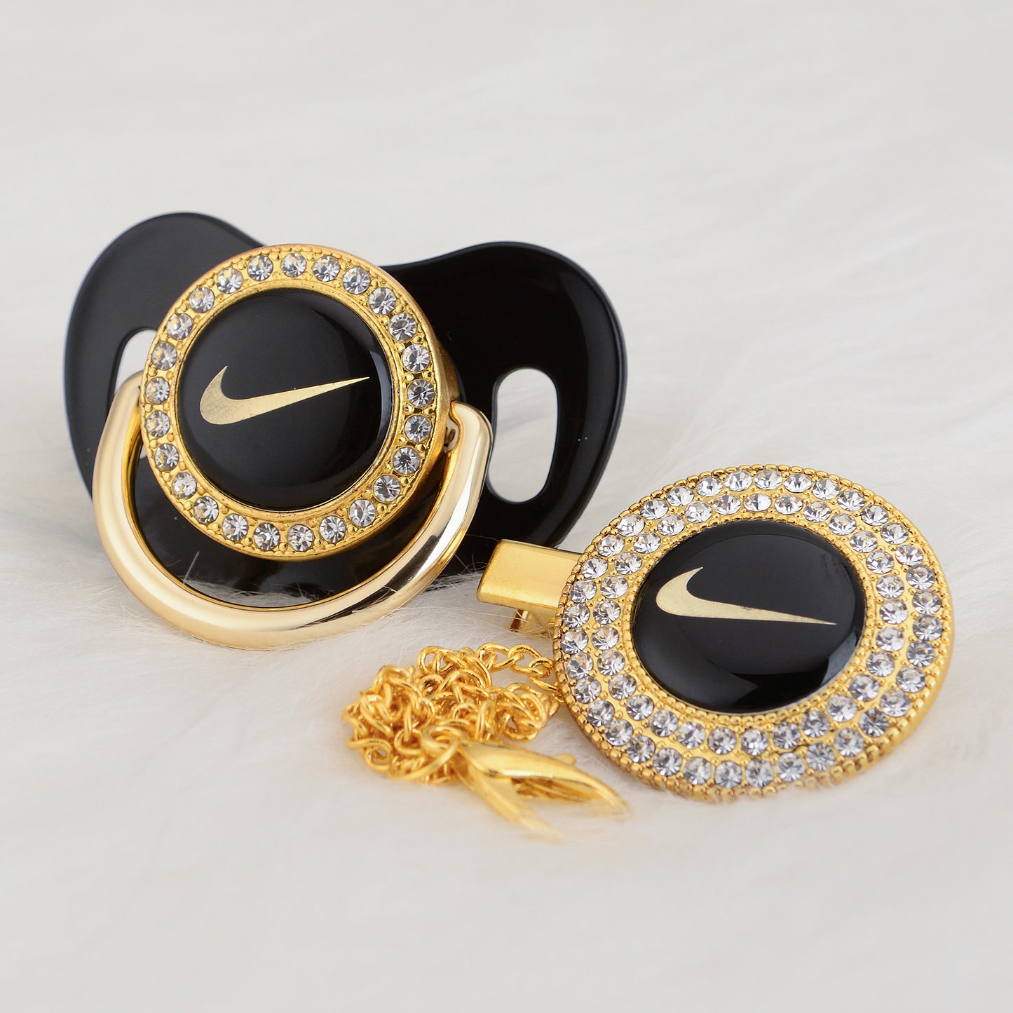 Premium Baby Schnuller Nike schwarz-gold mit Clip & Geschenkbox